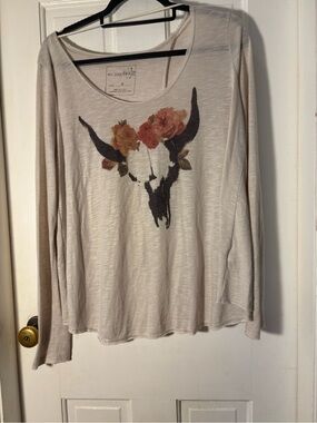 We The Free Cream Long-Sleeve Floral Skull Tee with an open back